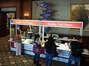 CSUN 2013 participants collect their exhibit hall passes