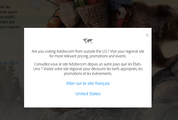 フランスからの訪問者がwww.adobe.comにアクセスした際に目にするアラートダイアログ