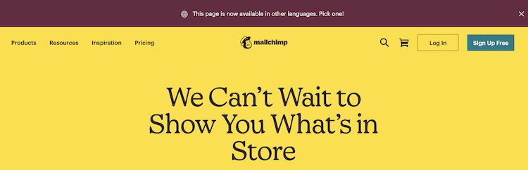 Mailchimpのサイトのヘッダー。英語で「This page is now available in other languages. Pick one!」と書かれています